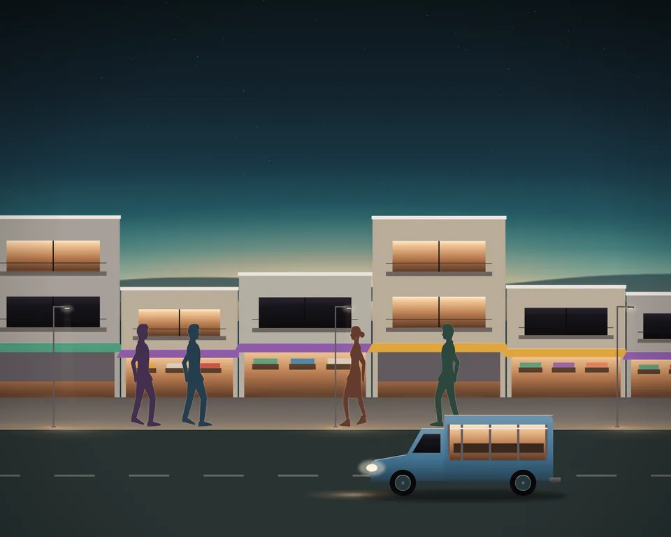 Illustration: a neighbourhood street at dusk: low shophouses with their shops open and lit, goods under coloured awnings, a baht bus passing