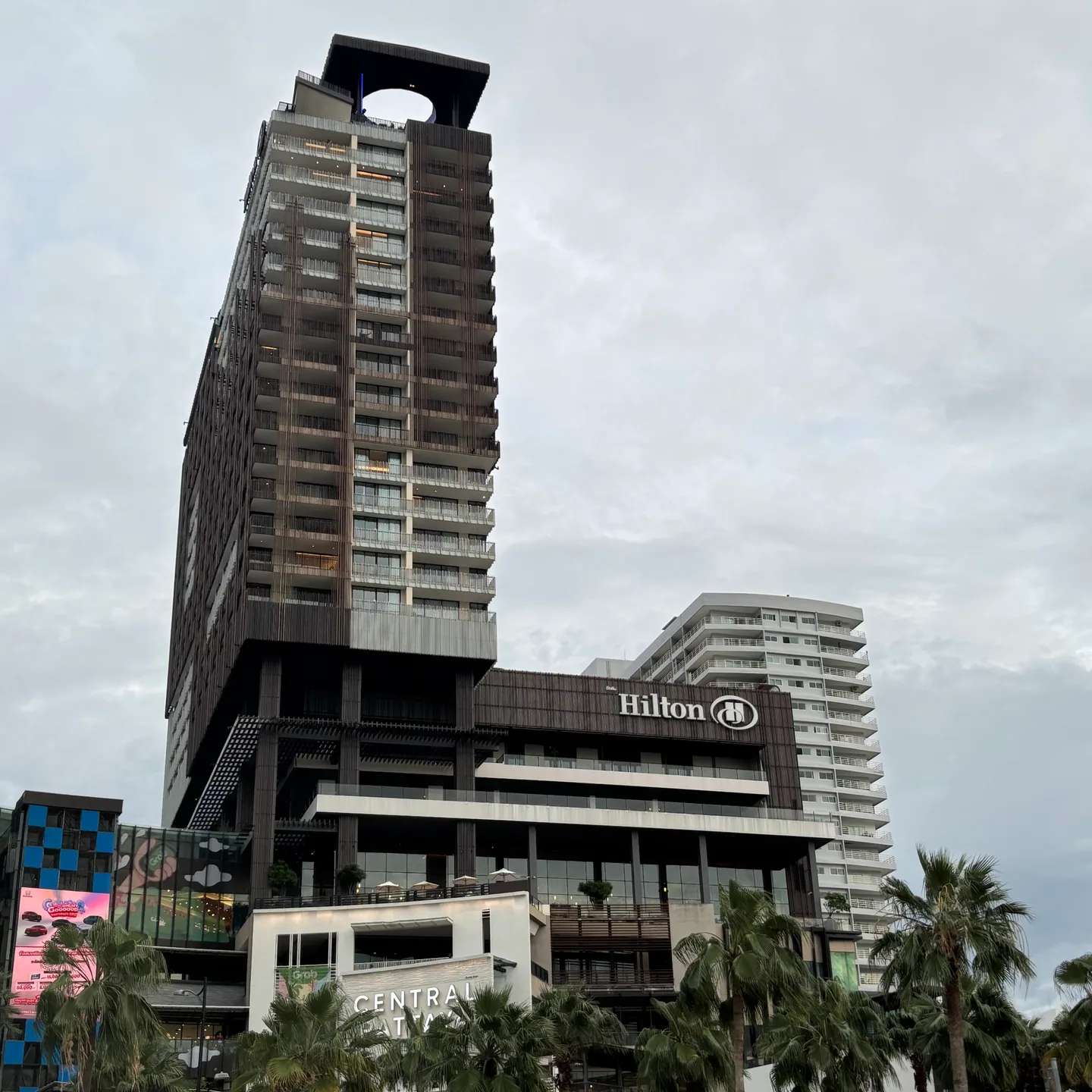 The Hilton Pattaya hotel tower and its Hilton sign above Central Pattaya.